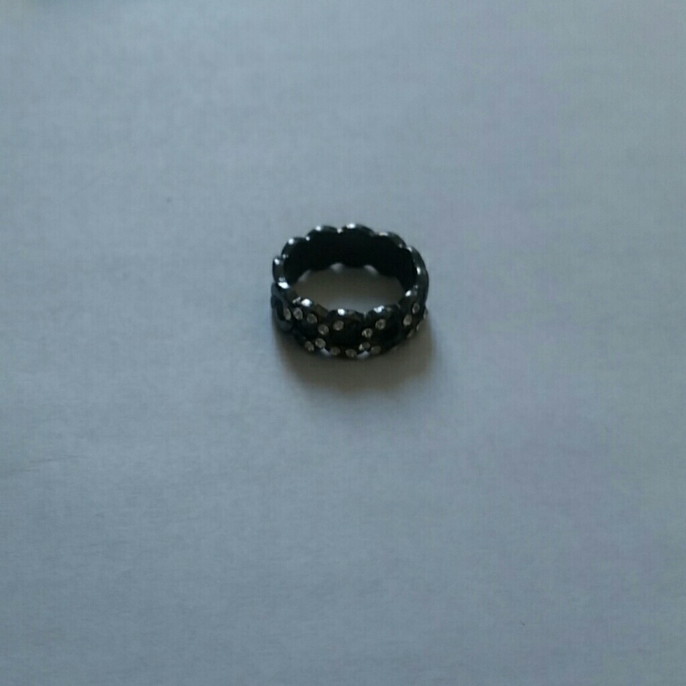 Black ring with small diamonds on the front